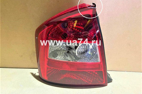 Фонарь левый Kia Cerato 2004-2006 4D (Китай / Скол уголка) Дисконт 15%
